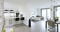 Musterhaus Bungalow Finess, offener Kochbereich, Wohnbereich und Essbereich