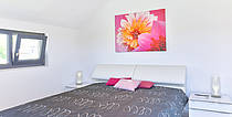 Musterhaus Brentano mit komfortablem Schlafzimmer in heller Optik