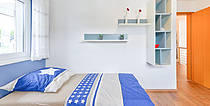 Musterhaus Florenzo, helles und freundliches Kinderzimmer im Dachgeschoss