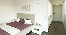 Musterhaus Bungalow Finess, Schlafzimmer mit angrenzender Ankleide