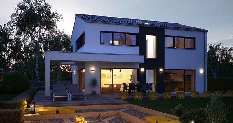 Architektenhaus Vitalis 135, puristisches Fertighaus von Büdenbender, Außenansicht bei Nacht